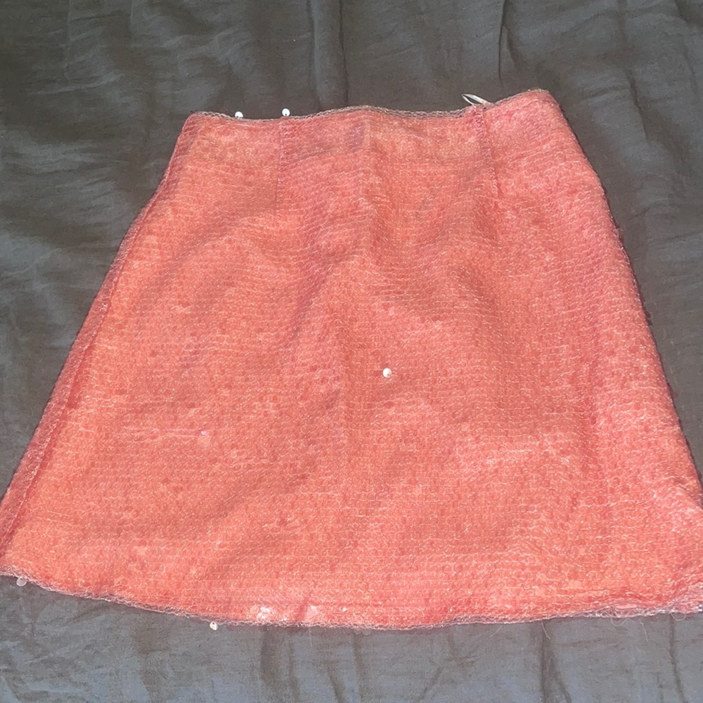 Pink sequin skirt.